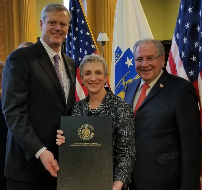 Rep. Balser with Governor Baker and Speaker DeLeo at the bill signing for her landmark gender equity in disability insurance.